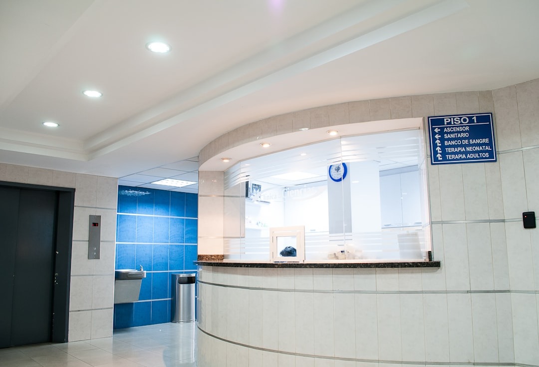 Bright hospital lobby corridor