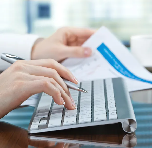 Tablet on a desk — brand protection and identity safety. Suggested replacement: warm editorial lighting, clean desk with documents.